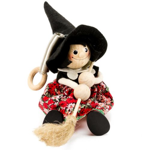Rugós figura (boszi, fekete kalappal, piros ruhában)