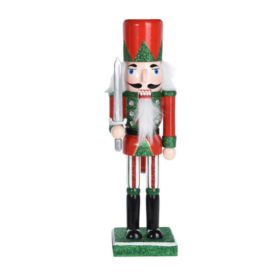 Diótörő (zöld-piros színű ruhában és kalappal, karddal a kezében)   Diótörő (zöld-piros színű ruhában és kalappal, karddal a kezében)